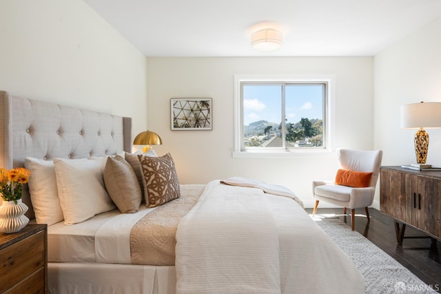 104 Bache St Unit A, San Francisco, CA 94110 - bedroom with wood finished floors and baseboards