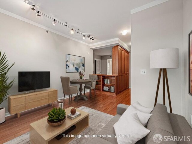 1701 Jackson St Unit 105, San Francisco, CA 94109 - living room with wood finished floors, ornamental molding, and track lighting