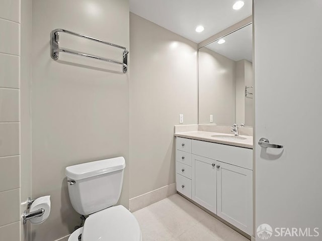 1701 Jackson St Unit 105, San Francisco, CA 94109 - bathroom featuring vanity, recessed lighting, toilet, tile patterned floors, and baseboards