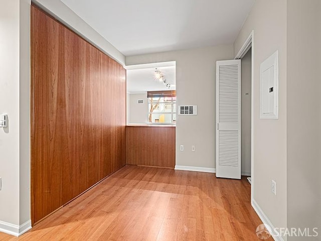 1701 Jackson St Unit 105, San Francisco, CA 94109 - unfurnished room featuring electric panel, visible vents, and wood finished floors