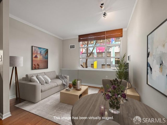 1701 Jackson St Unit 105, San Francisco, CA 94109 - living room with visible vents, baseboards, ornamental molding, and wood finished floors