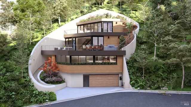 77 Crescent Ave, Sausalito, CA 94965 - view of front of house with stairway, a garage, concrete driveway, a balcony, and stucco siding