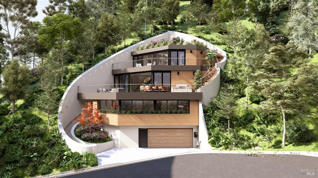 77 Crescent Ave, Sausalito, CA 94965 - view of front of property with a balcony, driveway, a garage, and stucco siding