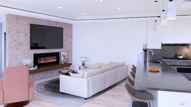 77 Crescent Ave, Sausalito, CA 94965 - living room with a fireplace, light wood finished floors, and recessed lighting