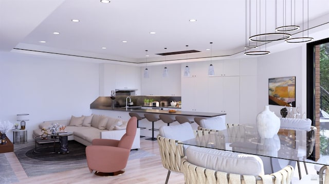 77 Crescent Ave, Sausalito, CA 94965 - living area with recessed lighting, a tray ceiling, and light wood-style flooring