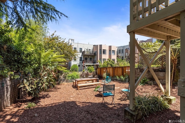 view of playground featuring fence