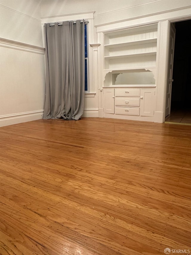 unfurnished bedroom featuring light wood-style floors