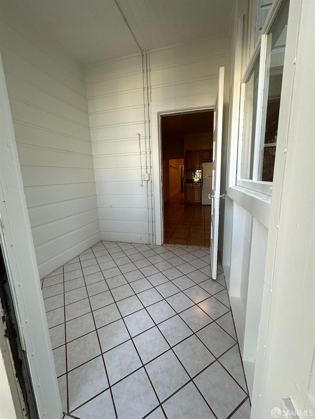 interior space with light tile patterned floors