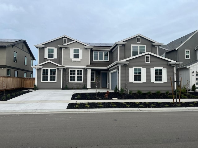 view of front of house featuring solar panels