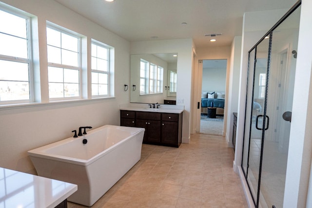 bathroom featuring vanity, visible vents, ensuite bathroom, recessed lighting, and a shower stall