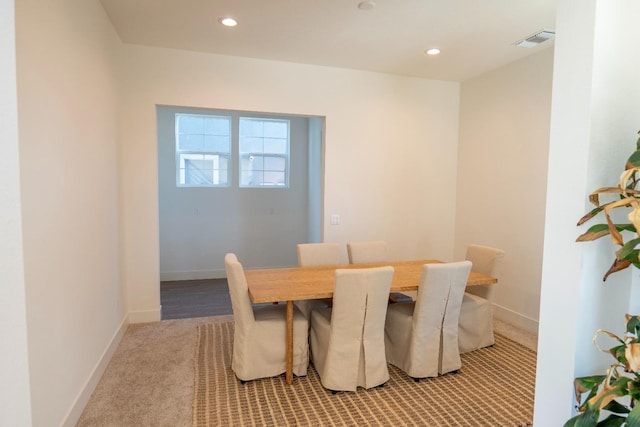 dining area featuring baseboards, carpet flooring, recessed lighting, and visible vents