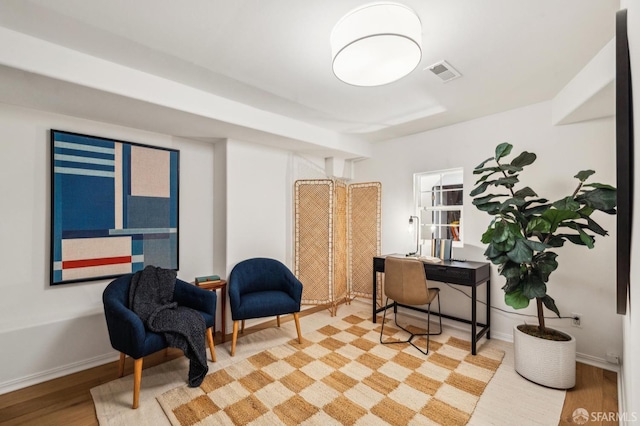 home office with light wood-type flooring