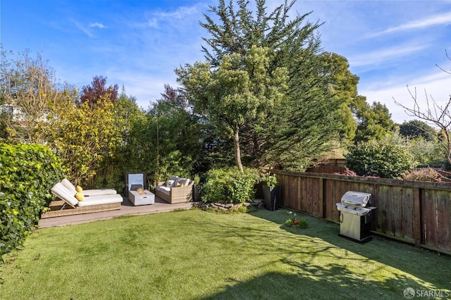 view of yard featuring an outdoor hangout area and fence