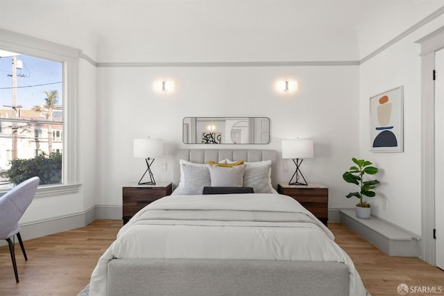 bedroom featuring wood finished floors