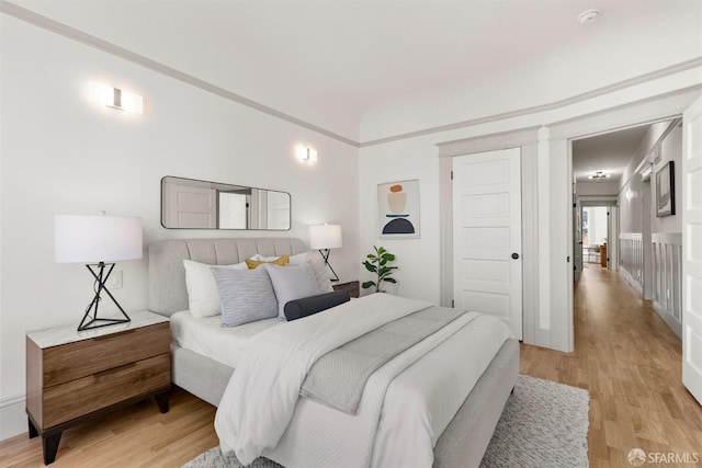 bedroom with light wood-style flooring