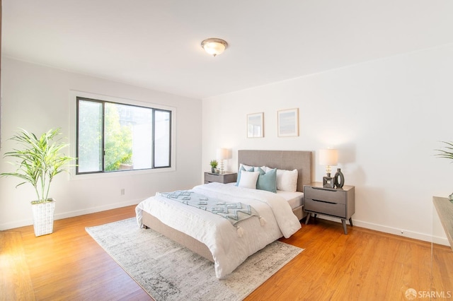 bedroom featuring light wood-type flooring