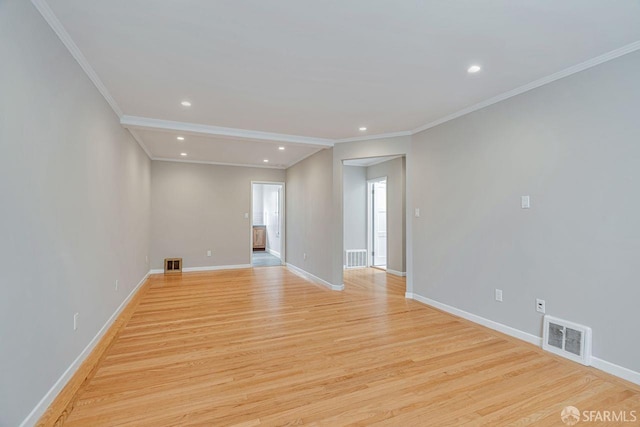 spare room featuring recessed lighting, baseboards, visible vents, and light wood finished floors