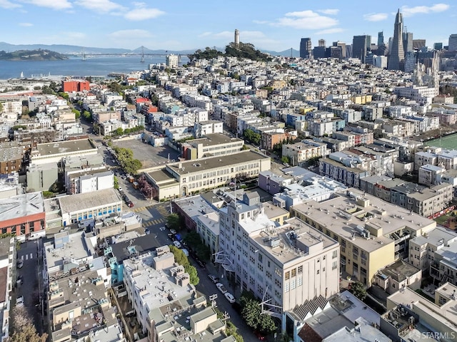 aerial view with a view of city and a water view