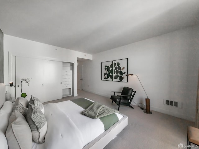 carpeted bedroom with visible vents