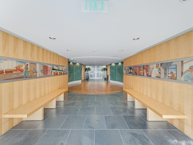 hall featuring wallpapered walls and recessed lighting