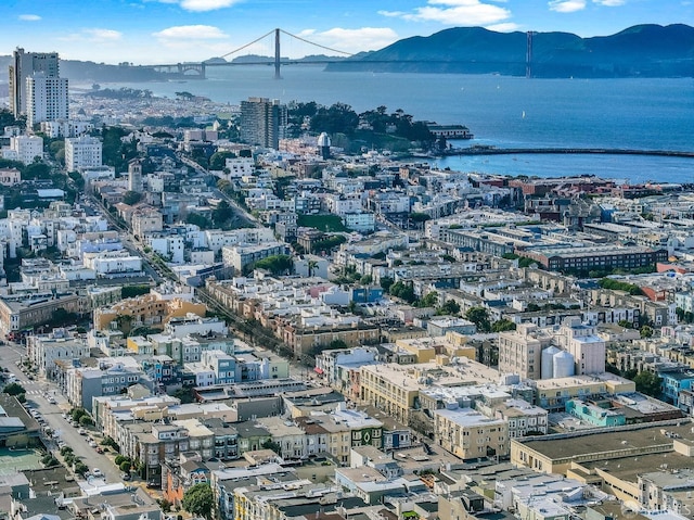 city view featuring a water and mountain view