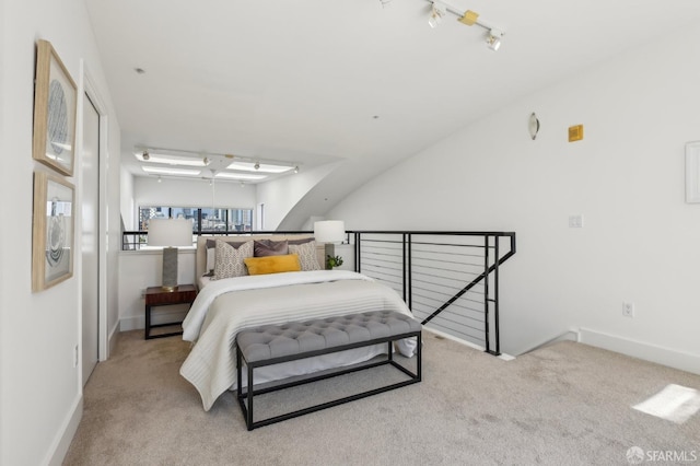 239 8th St Unit 14, San Francisco, CA 94103 - carpeted bedroom with baseboards and rail lighting