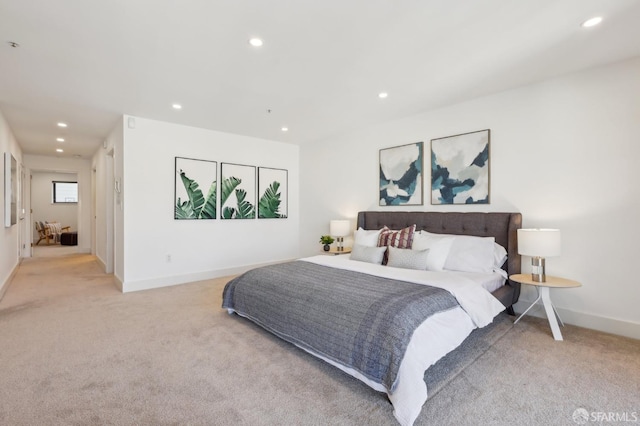 239 8th St Unit 14, San Francisco, CA 94103 - bedroom with light carpet, recessed lighting, and baseboards