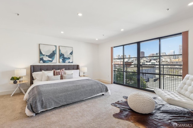 239 8th St Unit 14, San Francisco, CA 94103 - carpeted bedroom with baseboards, recessed lighting, and a city view