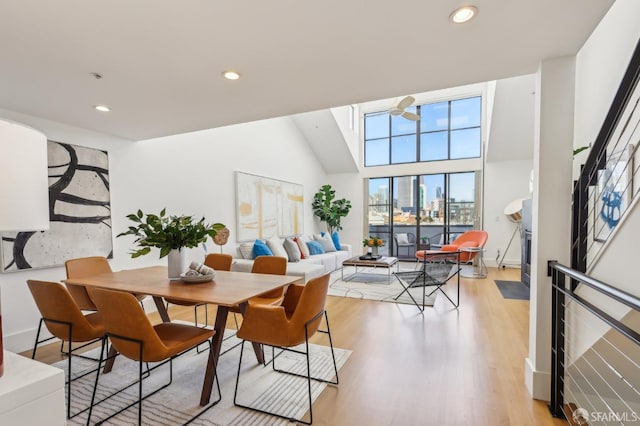 239 8th St Unit 14, San Francisco, CA 94103 - dining space featuring recessed lighting, light wood-style flooring, ceiling fan, a high ceiling, and baseboards