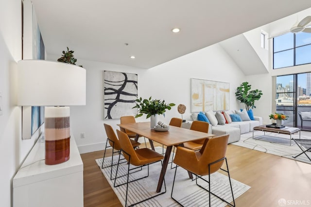 239 8th St Unit 14, San Francisco, CA 94103 - dining space featuring wood finished floors, recessed lighting, baseboards, and lofted ceiling