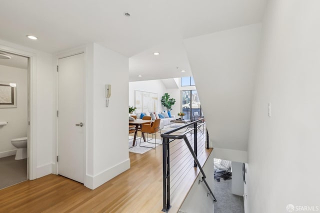 239 8th St Unit 14, San Francisco, CA 94103 - corridor featuring light wood-style floors, baseboards, an upstairs landing, and recessed lighting