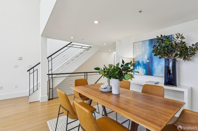 239 8th St Unit 14, San Francisco, CA 94103 - dining area with light wood-style floors, stairway, recessed lighting, and baseboards