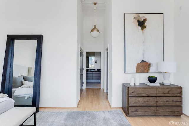 151 Alice B Toklas Pl Unit 610, San Francisco, CA 94109 - hall with light wood-type flooring and a high ceiling
