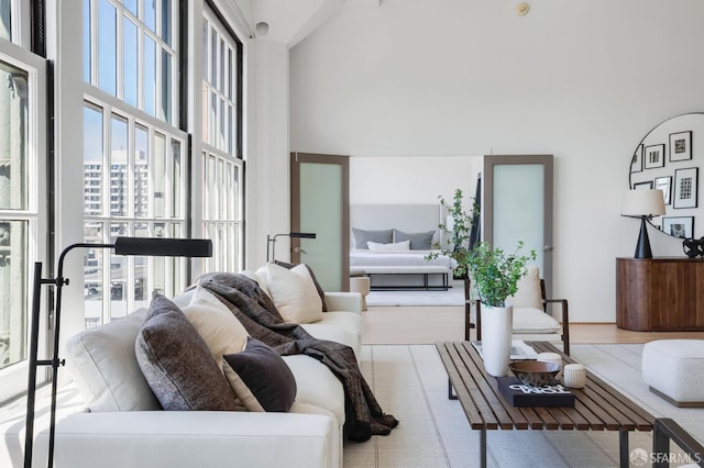 151 Alice B Toklas Pl Unit 610, San Francisco, CA 94109 - living room with a towering ceiling and wood finished floors