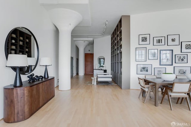 151 Alice B Toklas Pl Unit 610, San Francisco, CA 94109 - hall with decorative columns and light wood finished floors
