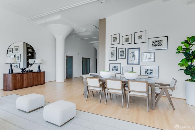 151 Alice B Toklas Pl Unit 610, San Francisco, CA 94109 - dining area with wood finished floors and ornate columns