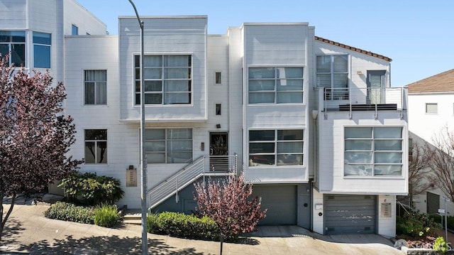 364 Arkansas St, San Francisco, CA 94107 - view of front facade with an attached garage and concrete driveway