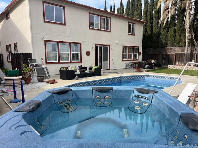 view of pool featuring outdoor lounge area and a patio area