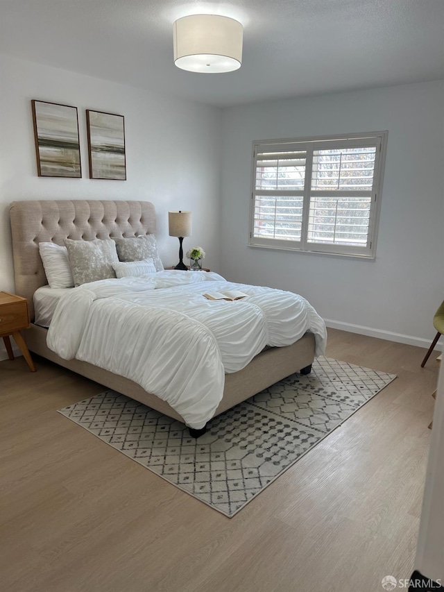 bedroom featuring light hardwood / wood-style floors