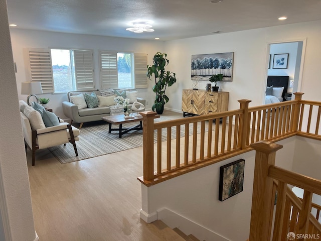 living room with light hardwood / wood-style floors