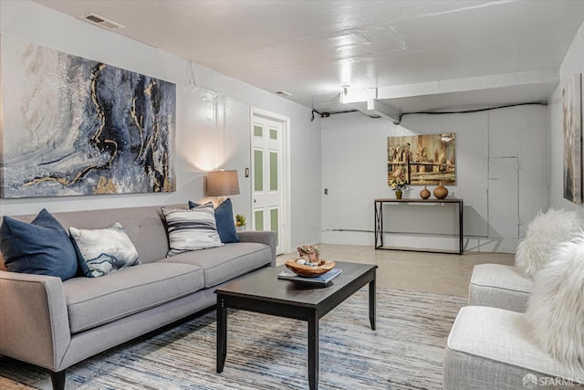 tiled living area with visible vents