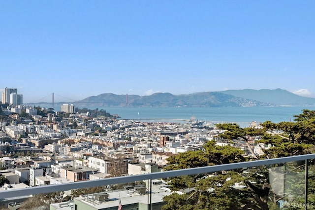 view of mountain feature with a water view