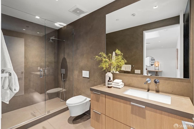 bathroom featuring toilet, tile patterned floors, vanity, and an enclosed shower