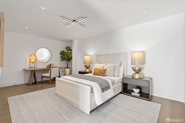 bedroom featuring light hardwood / wood-style floors