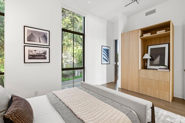 bedroom featuring hardwood / wood-style floors