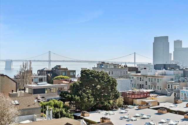 property's view of city featuring a water view