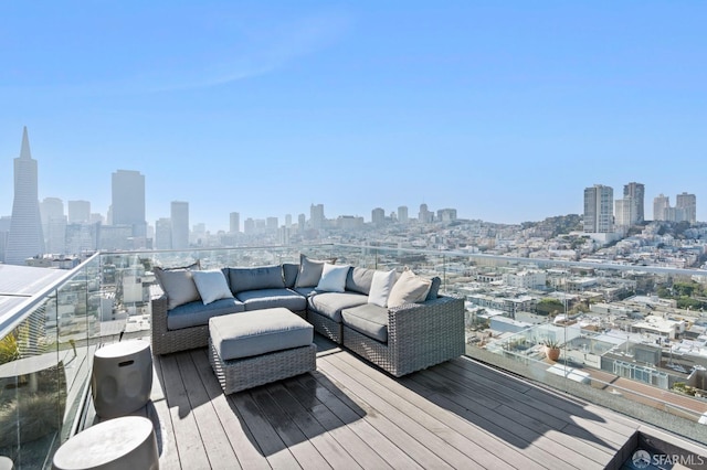 wooden deck with an outdoor living space