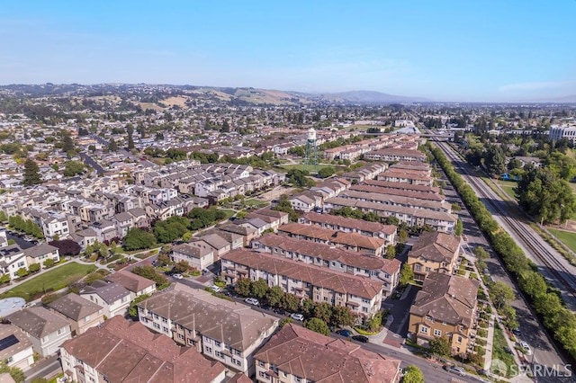 birds eye view of property with a residential view