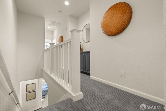 stairs with carpet floors, recessed lighting, baseboards, and visible vents