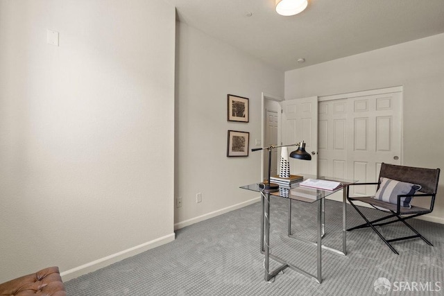 office area featuring carpet flooring and baseboards
